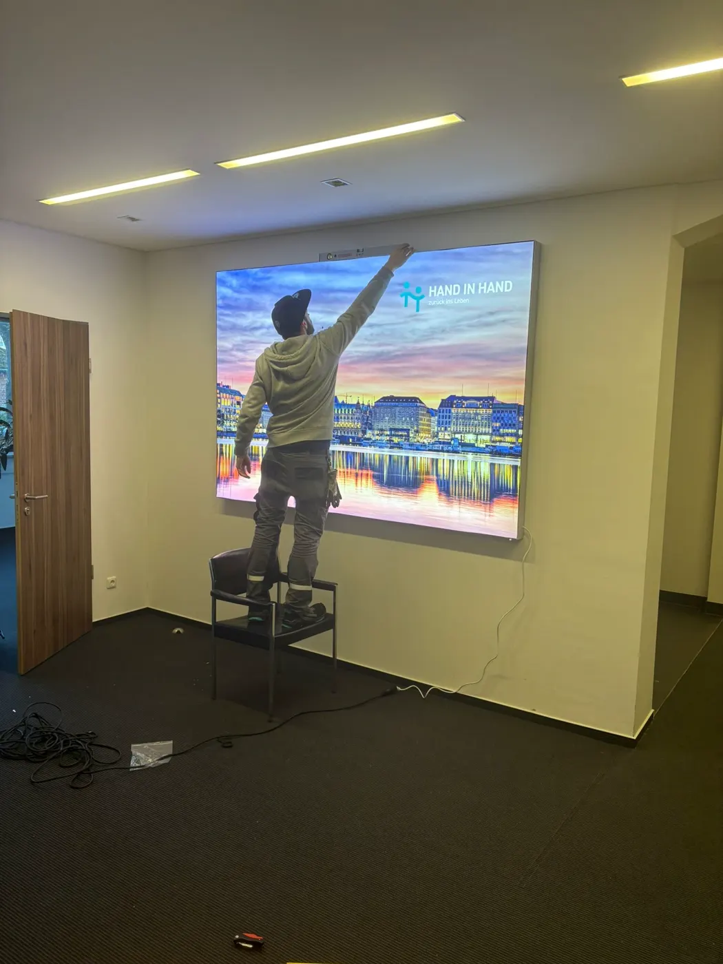 Mounting a light wall with a city image