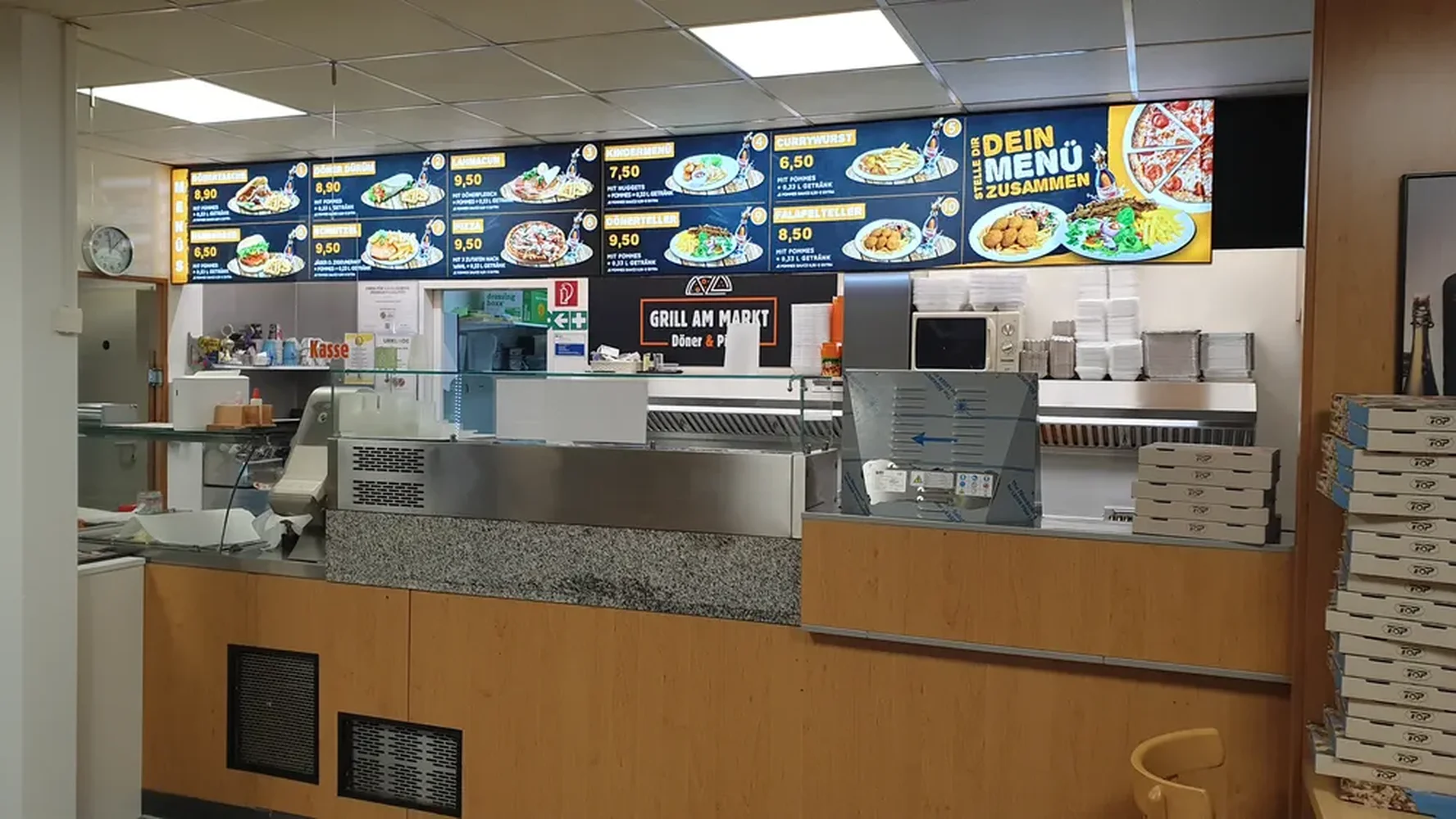 Lightboxes with the menu above the serving counter