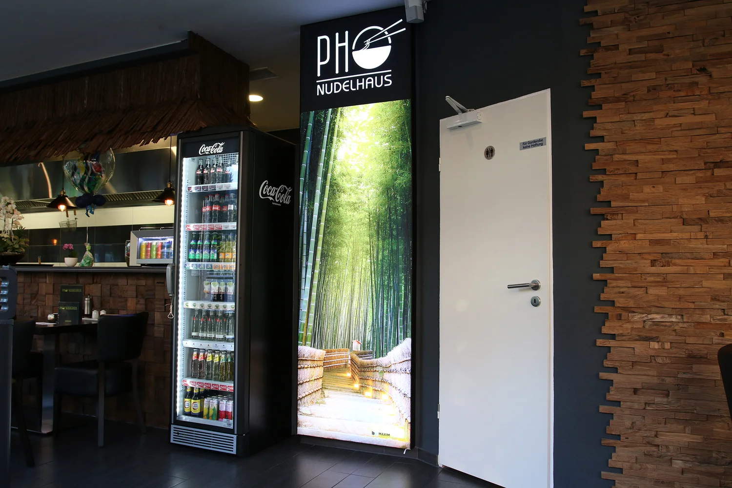 Bamboo image in portrait format next to the fridge