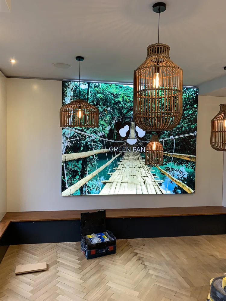 Room-height light wall above the bench seat