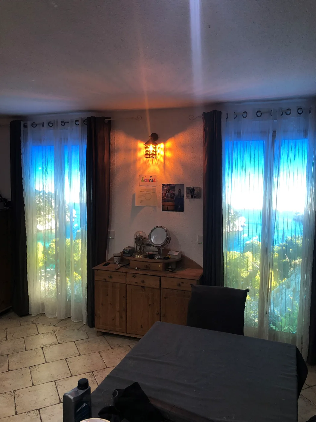 Backlit surfaces behind the curtains
